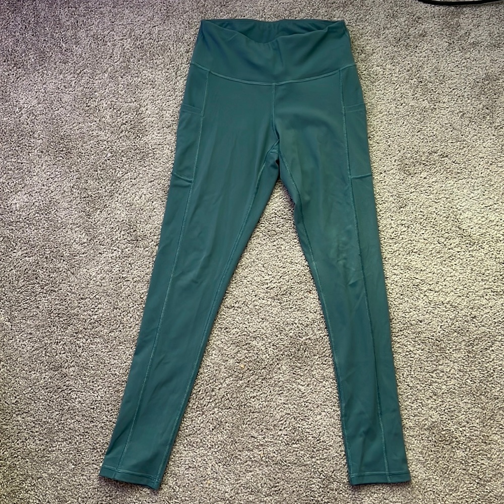 Mint green leggings with pockets,lightly used